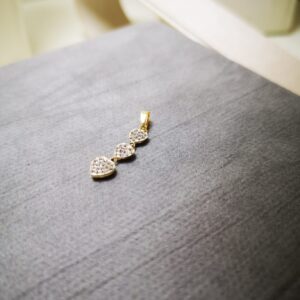 Ciondolo trilogy cuori zirconati oro 18K