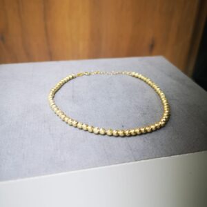 Bracciale mille luci palline in oro giallo 18K