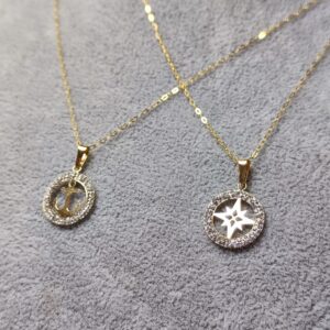 Ovalina con Rosa dei Venti oppure Ancora oro 18K